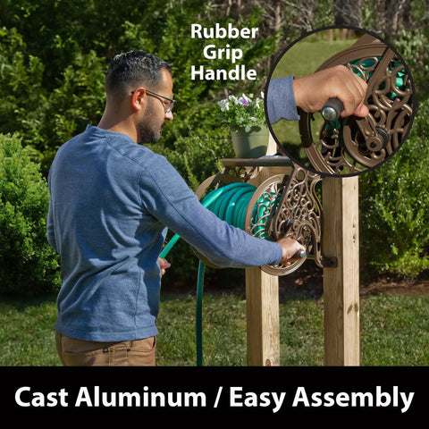 Man using Decorative Cast Aluminum Wall Mount Garden Hose Reel Holds 125 Feet Of Five Eighths Inch Hose Bronze Finish in garden