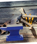 Heavy Duty Iron Hand Knocker With Single Horn For Shaping And Bending Metal in rustic workshop setting
