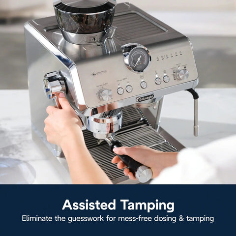 Specialista Opera Espresso Machine With Built In Grinder And Smart Tamping 19 Bar Pressure Quick Heat Milk Frother Barista Grade Steam Wand Perfect For Lattes And Cappuccinos At Home, showing hands tamping espresso.