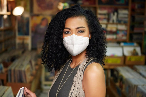 Person wearing Filtering Barrier Face Covering AFFM-5 One Size 5-Pack With Stretchable Side Bands in a store environment