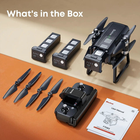 Pro Grade 4K Drone With 3 Axis Gimbal For Adults, batteries, remote, propellers, and manual displayed on table.