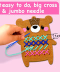 Child using Beginner Needlepoint Cross Stitch Kit For Kids Ages Five To Eight with jumbo needle on bear pattern.