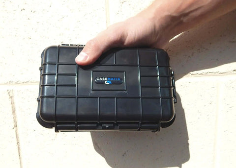 Bad Boy 8 Inch Waterproof Hard Case With Custom Diced Foam held in hand, showing impact resistant design for tools.