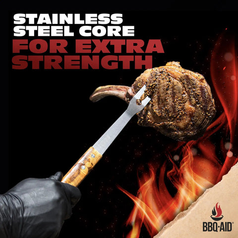 Stainless steel fork from Three Piece BBQ Grillin Accessories Set With Heavy Duty Stainless Steel Tools And Solid Hardwood Handles Tongs Spatula Fork Kit For Grilling Like A Pro Gift holding grilled meat