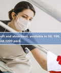 Person cleaning with Tough As Nails Cotton Shop Towels 12x14 Inches Pack Of 50 Plus 5 Bonus Reusable Cleaning Rags