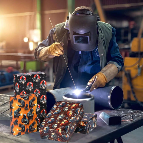 Welder Gift Wrap Bundle with 12 Sheets Welding Themed Paper Featuring Helmet and Tools Designs Ideal for Welders Available in Background.