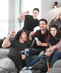Group of friends gaming with controllers connected by Ultra Long 10FT USB 3.0 Extension Cable Type A Male To Female.