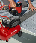 Badass 10 Gallon Oil Free Air Compressor Ultra Quiet 175 PSI Max Portable Shop Pump, red, used for roofing with nail gun.
