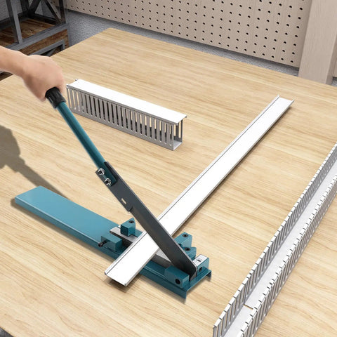 Manual Wire Duct Cutter For PVC Trunking And Open Slot Ducts with 45 and 90 Degree Blade, in use on wooden table.
