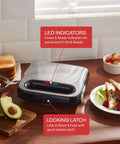 Go-To Panini Maker Grill Press For Quick Grilled Cheese And More 2 Slice, 750 Watt Stainless Steel on kitchen counter with LED indicators
