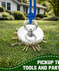 500 Lb Neodymium Fishing Magnet With Eyebolt on grass with nails attached, 60mm magnetic retrieval for lakes and yards.