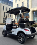 Kick Back In Comfort On This Sleek White Two Seater Electric Golf Cart showcasing black and brown interior design and dual seating.