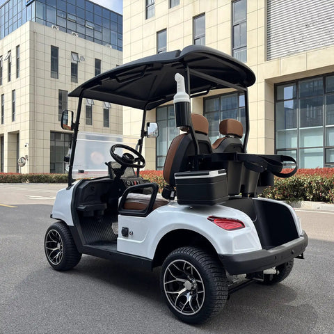 Kick Back In Comfort On This Sleek White Two Seater Electric Golf Cart showcasing black and brown interior design and dual seating.
