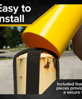 High Density Polyethylene Safety Bollard Covers Refresh Rusty Outposts With Zero Sweat Installation Plus Included Foam Pad For A Snug Setup Blocks Scratches On Pavement While Keeping The Area Looking Clean Without Any Extra Drama Year Round. Close-up of yellow bollard cover sliding over rusty metal post with foam for fit.