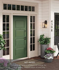 Outdoor Black Wall Sconce Light Fixture With Sturdy Iron Frame And Clear Glass Shade enhances green porch entryway