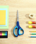 Left Handed 8.5 Inch Heavy Duty Scissors 3 Pack, blue handled scissors on desk with paper, glue, tape, and pencils