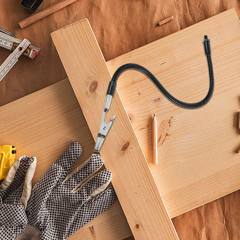 Alligator Clamp Welding Holder With Adjustable Flexible Arm And Magnifying Lamp Clip on a wooden workbench with tools.