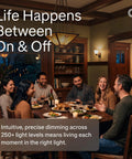 Buttery Smooth LED Dimmer Switch With Sleek Paddle Design For Single Pole And Three Way Installations To Banish Flicker And Buzz While Serving Up Straight Up Reliable Light Control For Everyday Bulbs Around The House in a cozy dining setting with friends.