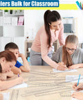 Classroom setting with teacher and students using 32 Pack Clear Rulers 12 Inch Dual Side Measuring Tools With Centimeters And Millimeters Bulk Metric Rulers For Kids Value Pack Great For Back To School Office And Home Projects.