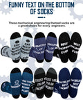 Six Pairs Mens Novelty Engineering Socks Set With Compasses Protractors Gears And Wrenches Cotton Crew Dress Socks Funny Gift For Engineer Dad Grandpa Birthday Fathers Day displayed with funny text on soles.