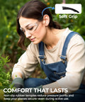 Woman wearing Four Pack Clear Safety Glasses With UV400 And ANSI Z87.1 Standards Built For The Daily Grind Impact Resistant Goggles outdoors.