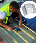 Worker installing solar panels with 50 Pcs Aluminum Solar Panel Mid Clamps 1.06 Inch For Roof Mounts, Silver Bulk Kit