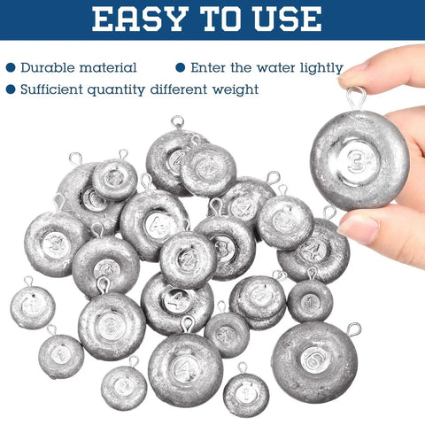 24 Piece Disc Sinker Set For Saltwater Fishing Catfishing Trolling And Surf Tackle Includes 1 2 3 4 6 Oz Weights Durable Lead Sinkers Built To Withstand Saltwater Corrosion, arranged with a person's hand holding one sinker.
