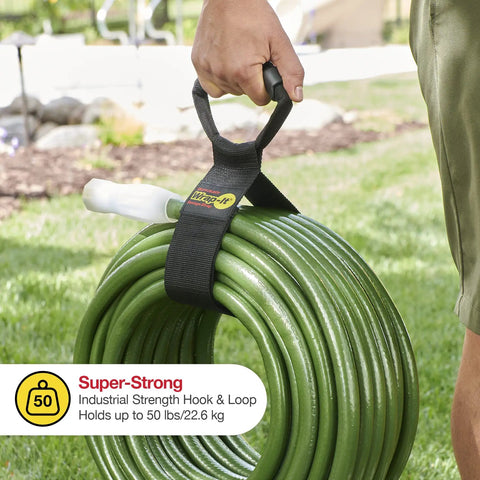 Heavy-Duty 28 Inch Storage Straps Set 2-Pack No-Fuss Hook And Loop Cord Carrier holding green garden hose