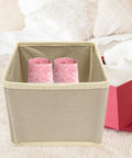 Totally Legit High Capacity Nonwoven Underwear And Sock Organizer Boxes with pink lace socks inside beige drawer.