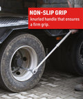Person using Extendable Three Quarter Inch Drive Ratchet With Locking Telescoping Shaft on truck wheel, no slip knurled grip.