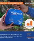 Front view of Adventure Medical Kits Mountain Series Backpacker Medical Kit, blue and orange, 96-piece