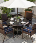 Navy Outdoor Chair Cushions Set Of 4, 18.5x16x3 Inches on patio furniture with white umbrella, waterproof and fade resistant.