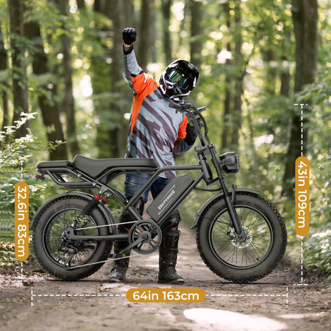 Rider with Beast Mode Electric Fat Tire Mountain Bike With Full Suspension, 1500W Peak Motor, in forest setting.