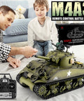 Father and son playing with One Sixteenth Scale RC Tank M4A3 Sherman With Two Point Four GHz Remote Control, box visible