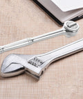 Heavy Duty 3/8 Inch Drive Ratchet Socket Wrench With Smooth Reversible Action And Quick Release Handle on a textured background.