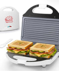 AshGlen White Ceramic Mini Panini Press Grill with two sandwiches cooking, compact design for healthy meals.