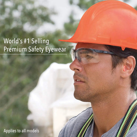 Person wearing Genesis Safety Glasses With Uvextreme Anti Fog Coating In Vapor Blue Frame For Any Task Versatile Lens Tints Indoors