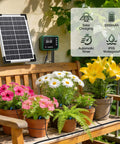 Solar Drip Irrigation System For Gardens And Greenhouses DIY Automatic Drip Kit With 8W Solar Panel, plants on bench.