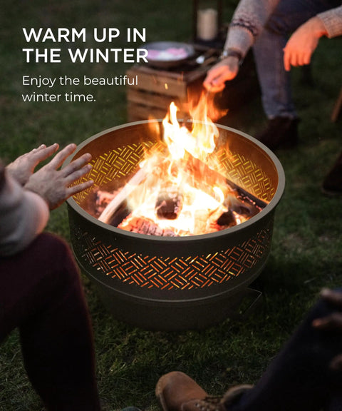 26 Inch Fire Pit With Grill And Lid For Outdoor Use surrounded by people enjoying a warm bonfire, creating a cozy winter social hub.