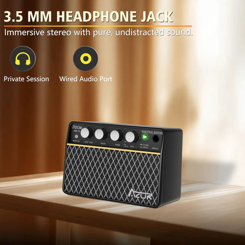 10W Wireless Portable Guitar Amp with Type C Rechargeable Battery showcasing 3.5mm headphone jack on wooden surface