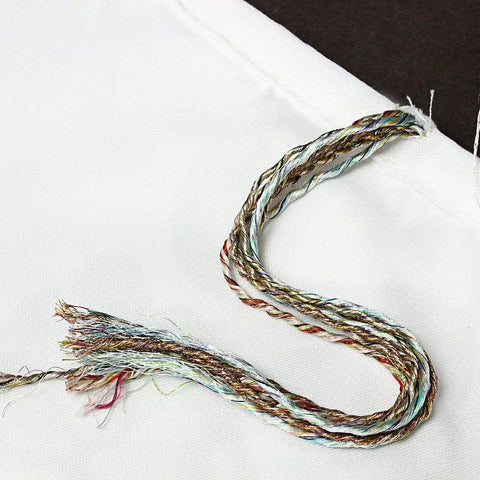 Close-up of stitching on Heavy Duty Chipper Shredder Collection Bag For Troy-Bilt MTD Lawn Equipment, showing durable polyester thread.