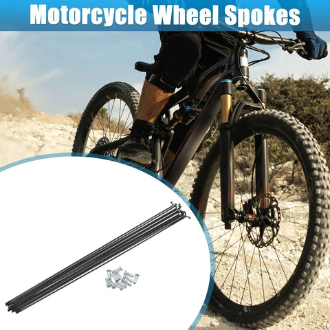 12 Pack 14G J Bend Bicycle Steel Spokes 290mm with Brass Nipples Replacement Kit for Mountain Bike MTB. Rider on rocky path.