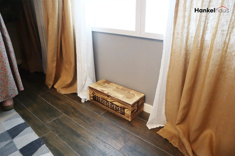 Large Wooden Cable Management Box For Home And Office beneath curtains in a room.