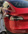 Portable Level 2 EV Charger With 32 Amp Adjustable Power RFID Delayed Start Timer 10 Meter Cable Europe Asia Type 2 IEC 62196 220V No Fuss Easy Charge On The Go With UK CEE Mennekes And Schuko Plugs connected to red electric car