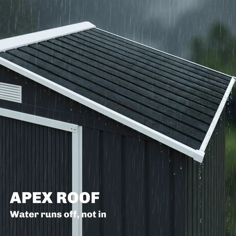 7x4 Outdoor Metal Storage Shed With Foundation Kit shown with rain-resistant sloped roof, dark gray color, close-up side view