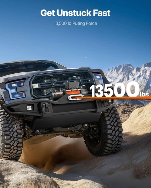 Beefy 13,500 Lb Electric Winch For Off Road Rigs And Trucks 12V DC Three Eighths Inch X 80 Ft Synthetic Rope on SUV in sand.
