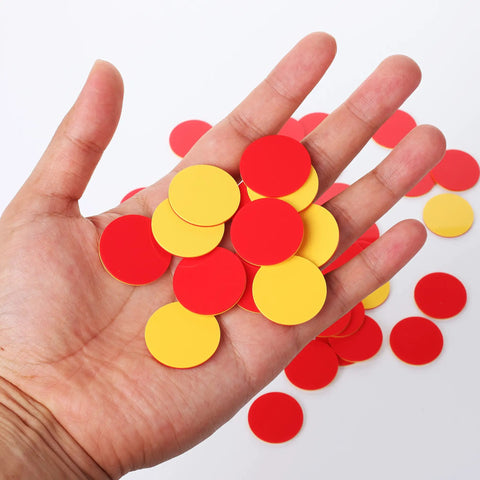 Totally Kid Approved Two Color Counters 100 Pack In Heavy Duty Plastic Case held in hand, vibrant red and yellow discs for math activities.