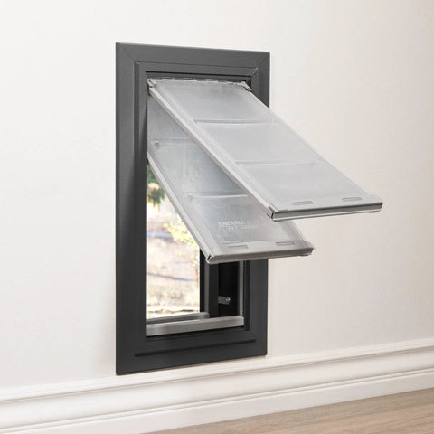 Top Shelf Double Flap Pet Door For Deep Walls Up To 13 Inches with clear flaps and heavy-duty aluminum frame in glossy black finish.