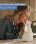 Woman using Drug Free Steam Inhaler for Sinus Congestion and Allergies with Quick 3 to 5 Minute Setup on kitchen counter.