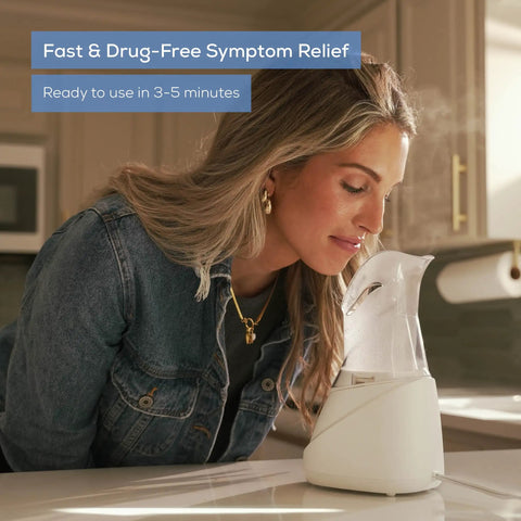 Woman using Drug Free Steam Inhaler for Sinus Congestion and Allergies with Quick 3 to 5 Minute Setup on kitchen counter.